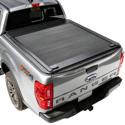 Back view of a Ford Ranger truck with a tonneau cover on a white background