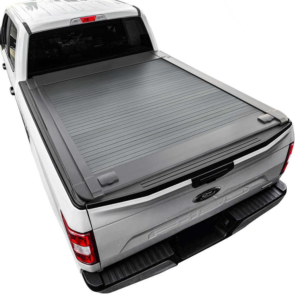 White F-150 standard bed truck with a Enhanced MB retractable tonneau cover on a white background