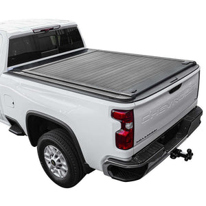 White Chevrolet truck with a tonneau cover on a white background