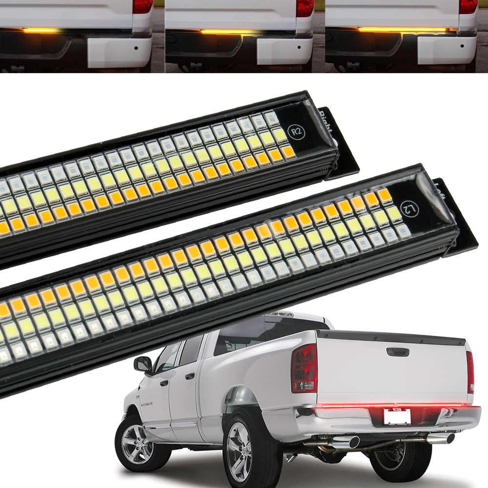 Two LED light bars with a white truck displaying their use.
