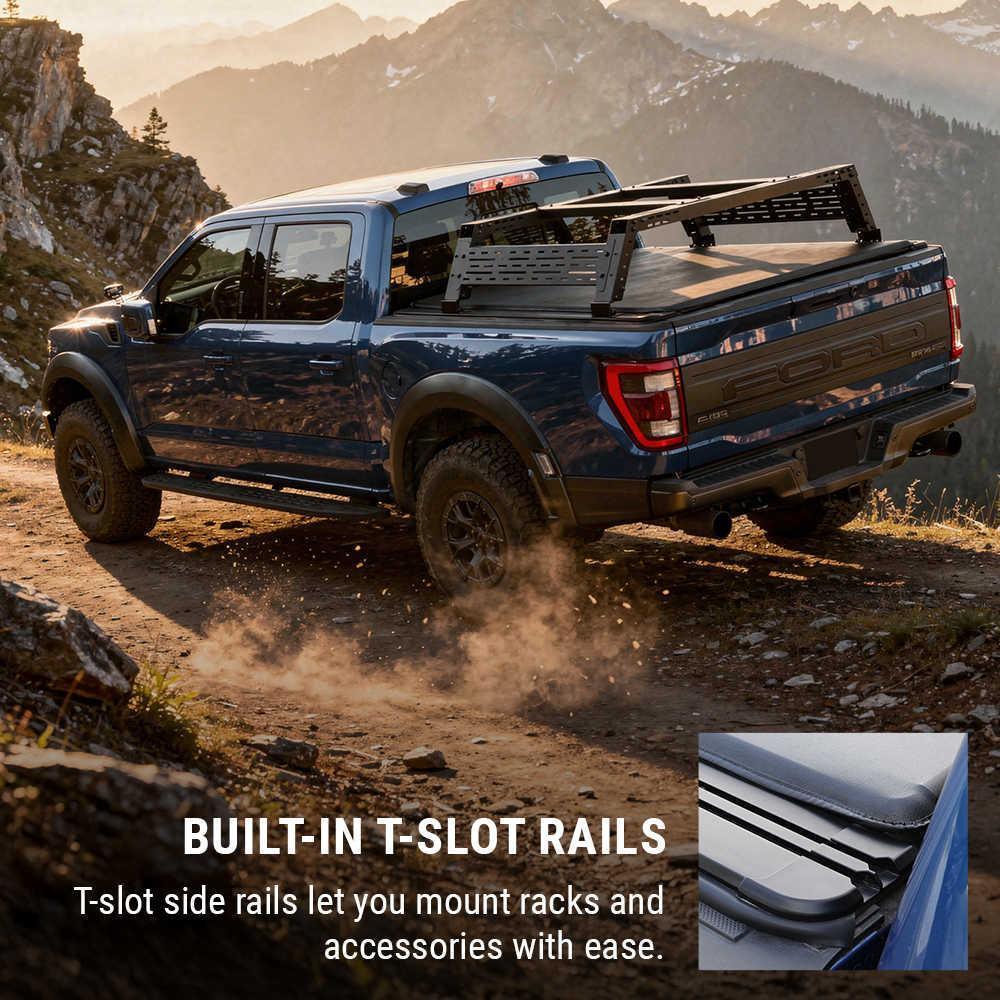 Blue truck with built-in T-slot rails with soft roll-up cover on a mountain road