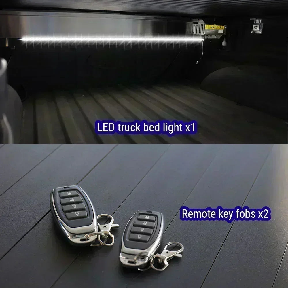 LED truck bed light and remote key fobs on a dark surface
