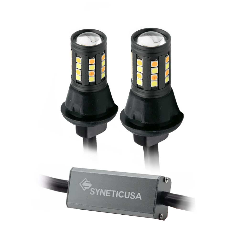 Two LED bulbs with a dual color switchback design and an external control module, branded by Syneticusa.