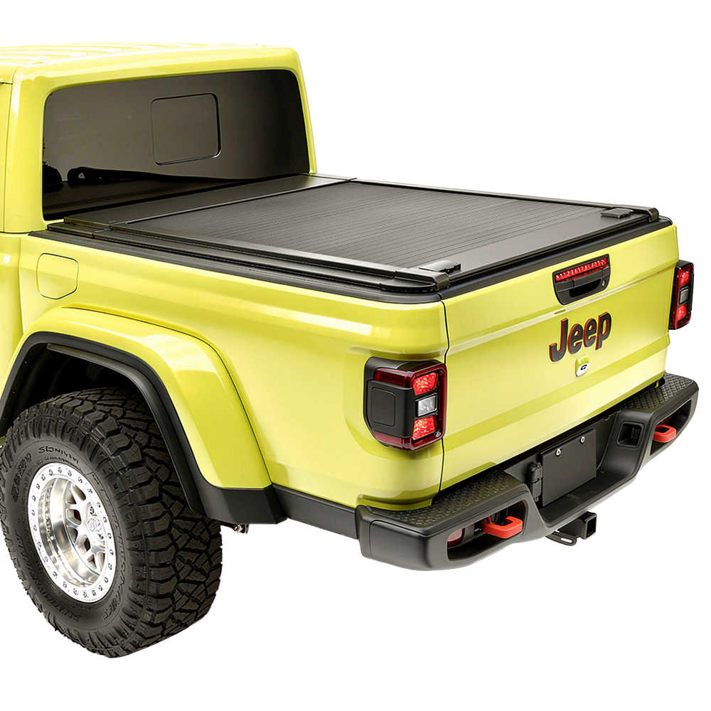 Yellow Jeep truck with a enhanced MB tonneau cover on a white background