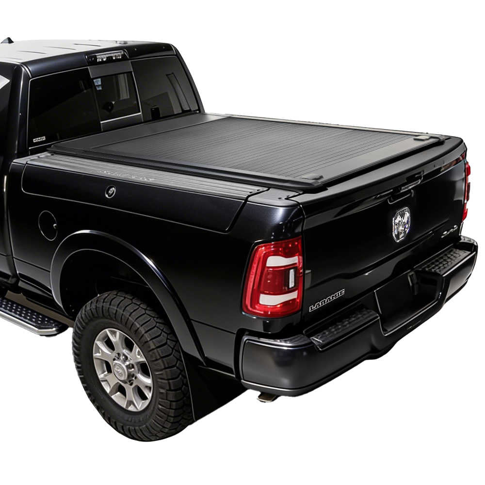 Black Ram with Rambox truck with a enhanced MB tonneau cover on a white background