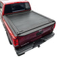 Red Titan truck with a black MR retractable tonneau cover on a white background