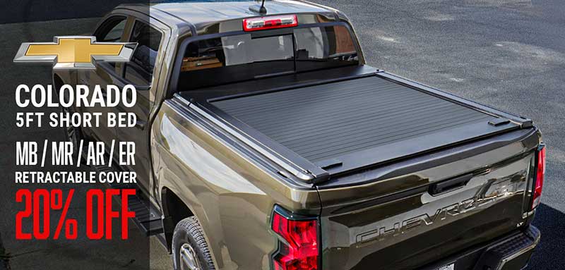 Chevrolet Colorado truck with a retractable cover on a road background, featuring promotional text.