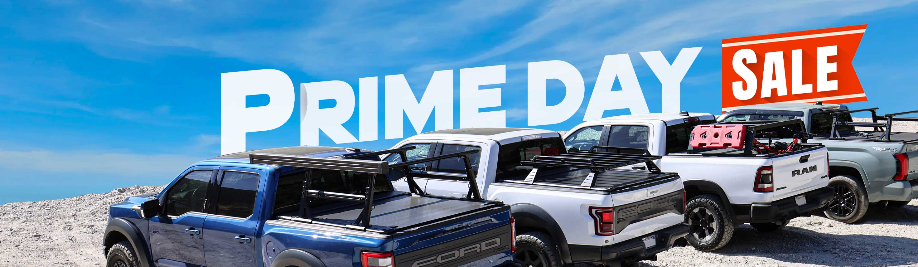 Promotional graphic for Prime Day sale with trucks and a blue sky.