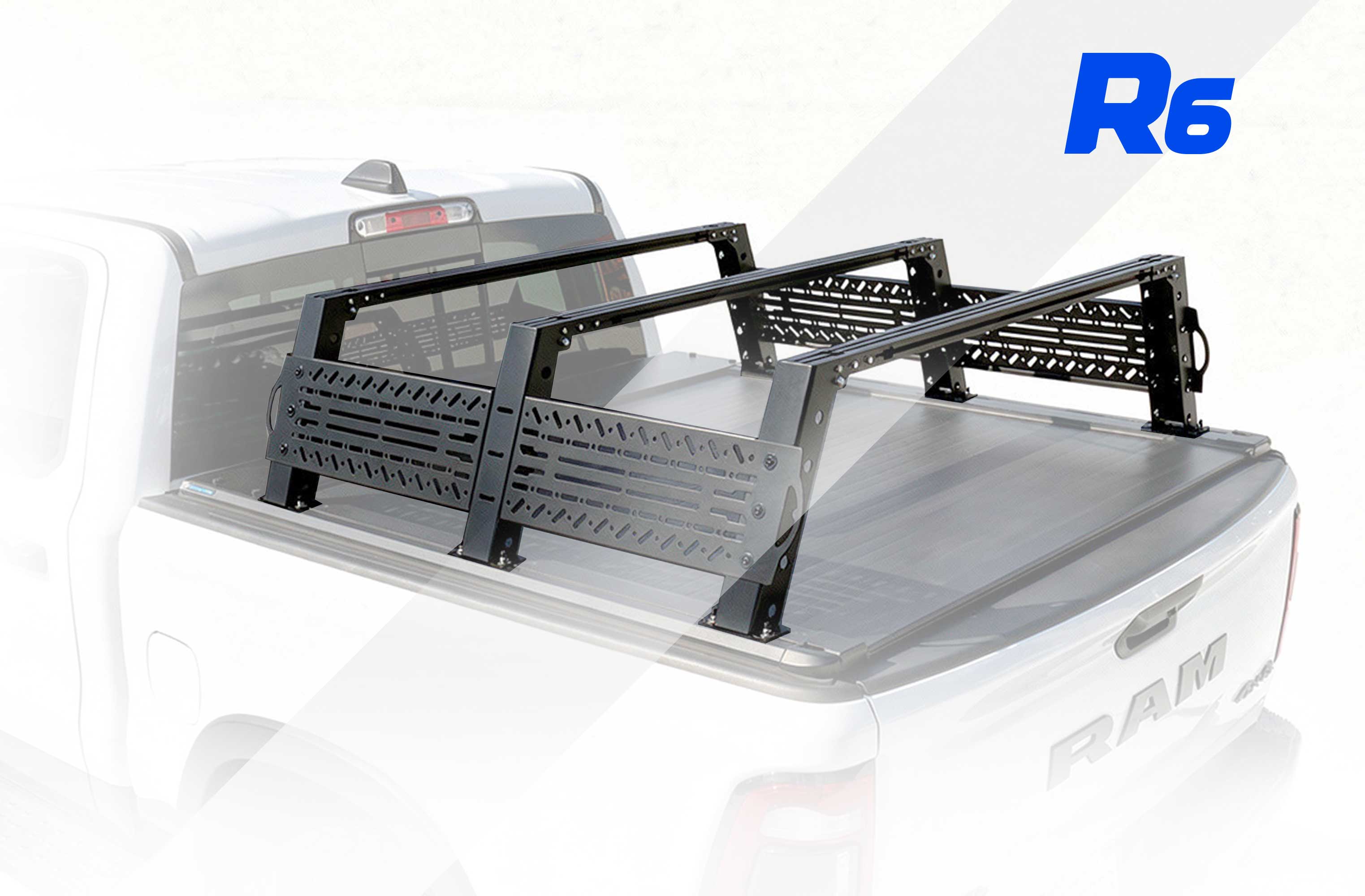 Truck bed rack on a white truck with 'R6 ' premium overland rack.